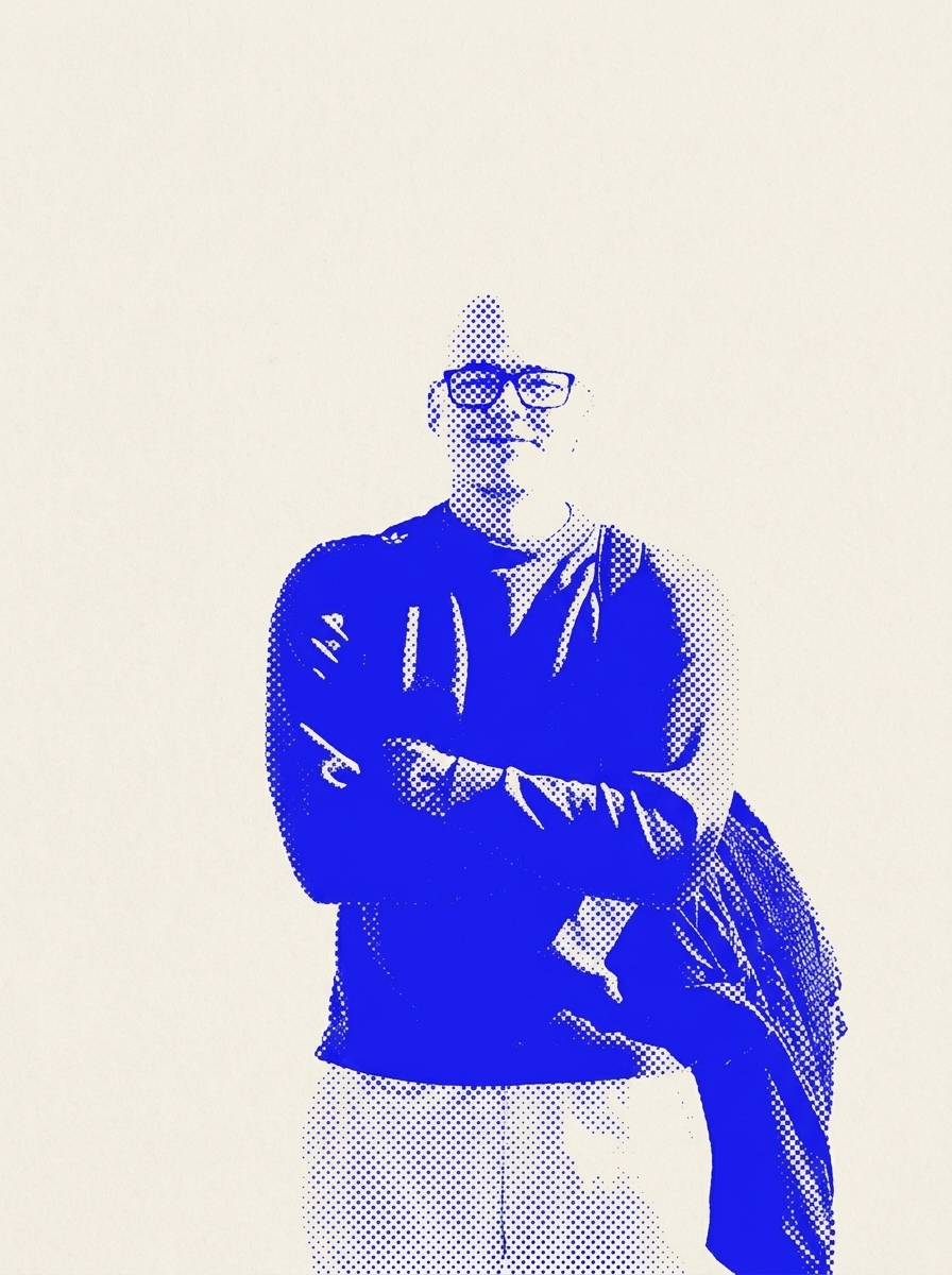 Halftone portrait of Daniel Holguin, arms crossed, wearing glasses, a jacket over one arm